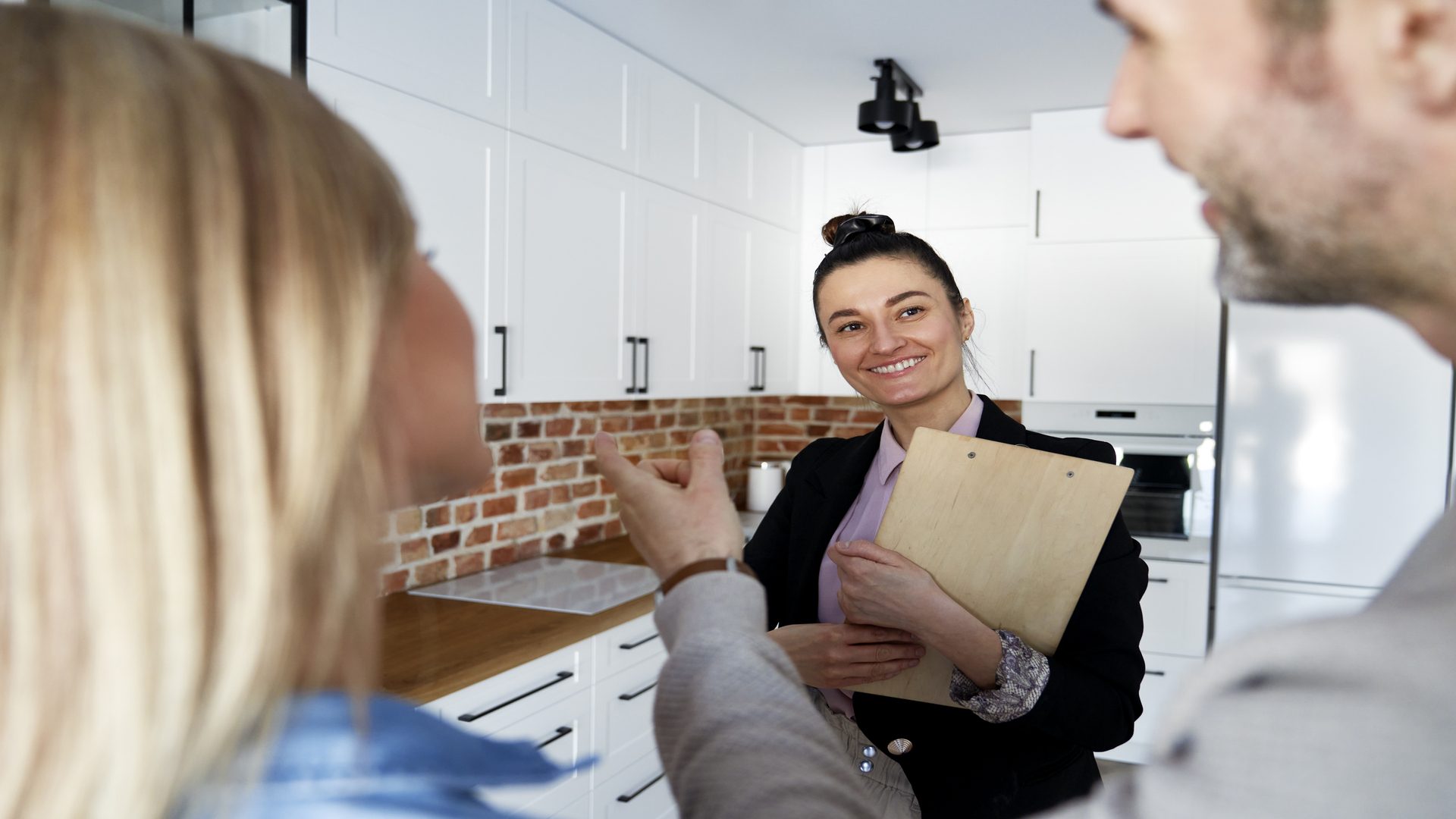 Specialist bridging loan broker in Brisbane explaining finance options to property buyers