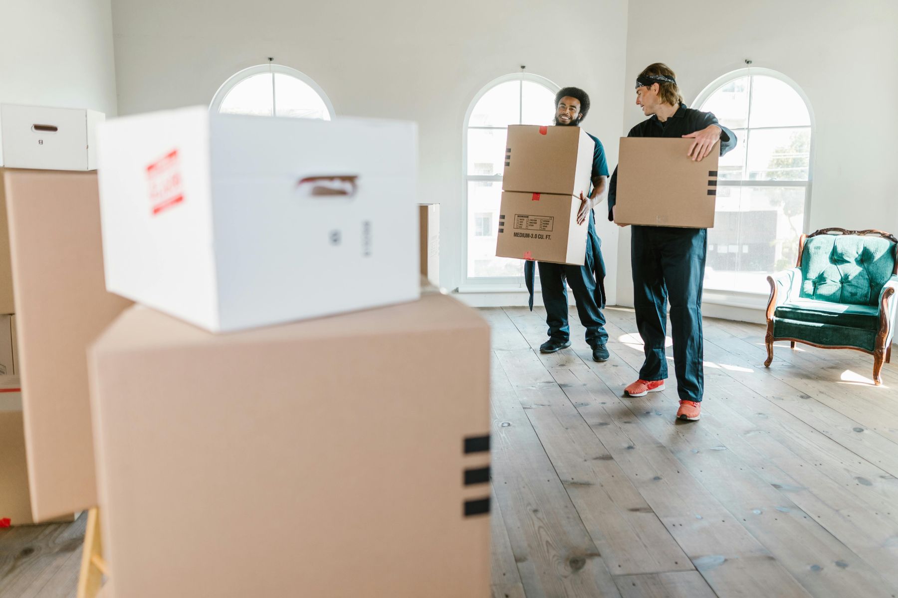 Concierge Move Service two men carrying boxes