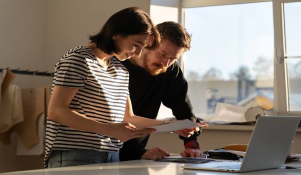 couples discussing independent bridging broker vs banks and lenders